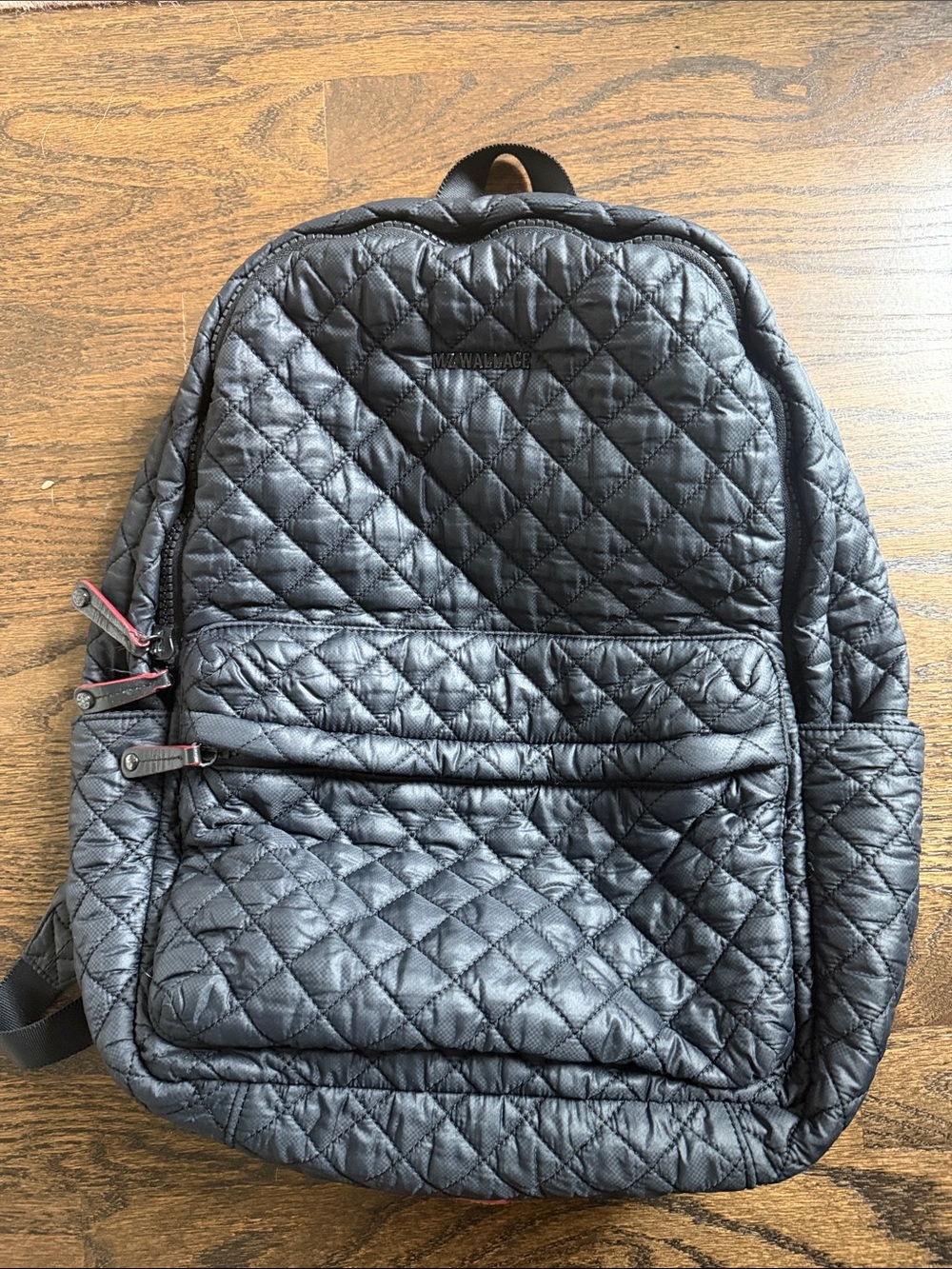 MZ Wallace Quilted Black Backpack with Front Zip Pocket
